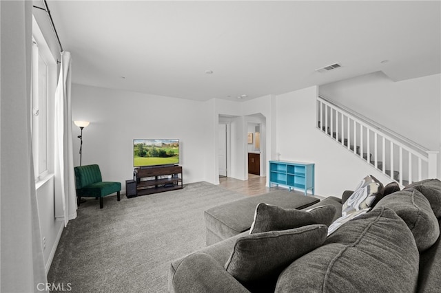 26382 Bramble Wood Cir, Menifee, CA 92584 - living room with carpet floors and stairway
