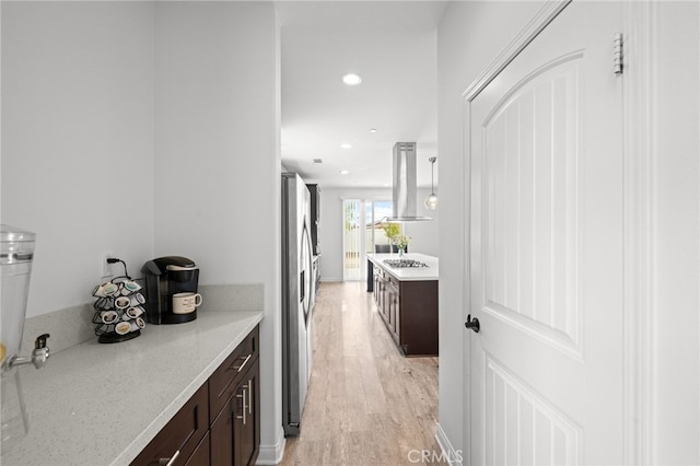 26382 Bramble Wood Cir, Menifee, CA 92584 - corridor with light wood finished floors and recessed lighting