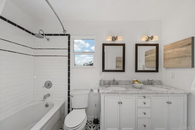 full bathroom featuring shower / bathing tub combination, double vanity, toilet, and a sink