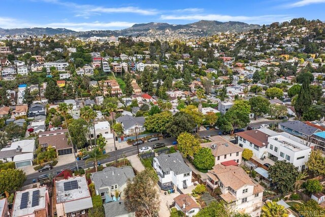 aerial view featuring a residential view and a mountain view