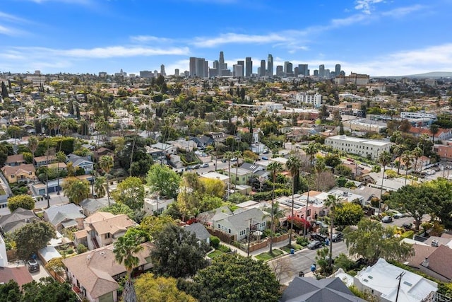 birds eye view of property featuring a city view