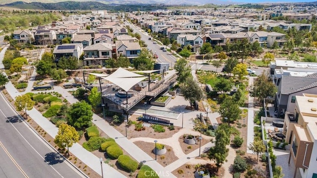bird's eye view with a residential view and a mountain view