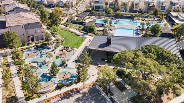 birds eye view of property with a residential view