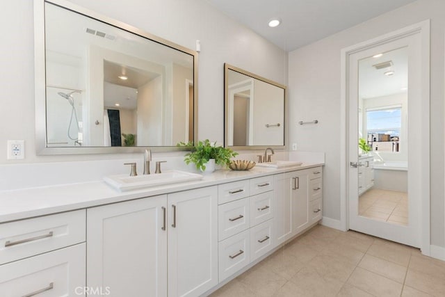 108 Shear, Irvine, CA 92618 - full bath with double vanity, tile patterned flooring, a bath, baseboards, and recessed lighting