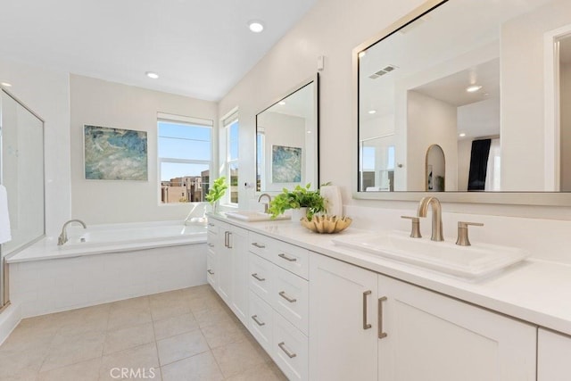 108 Shear, Irvine, CA 92618 - bathroom featuring tile patterned floors, a garden tub, double vanity, and recessed lighting