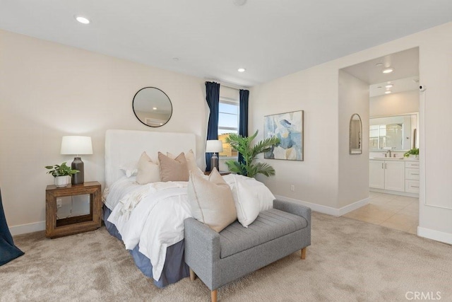 bedroom with light carpet, baseboards, and recessed lighting