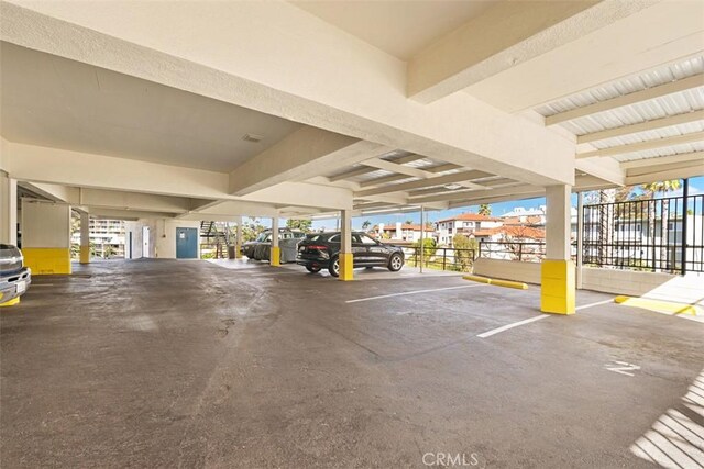 parking deck featuring fence