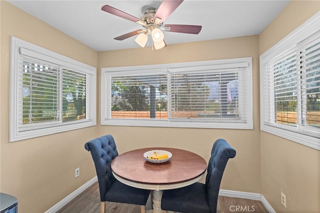 6816 Ridgeside Dr, Riverside, CA 92506 - dining room featuring baseboards, wood finished floors, and a ceiling fan