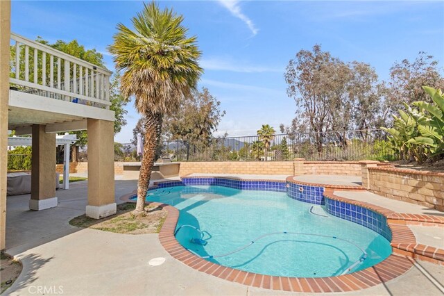 6816 Ridgeside Dr, Riverside, CA 92506 - view of pool featuring a fenced backyard and a patio