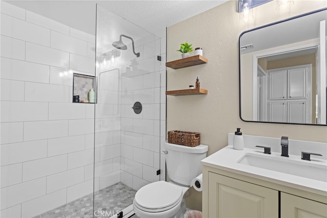 6816 Ridgeside Dr, Riverside, CA 92506 - bathroom with a walk in shower, toilet, vanity, and a textured wall