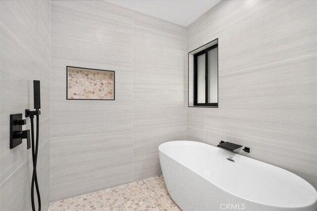 2037 Rayshire St, Thousand Oaks, CA 91362 - full bath featuring a freestanding tub, tile walls, and tile patterned floors