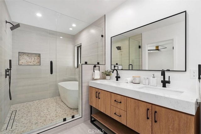 2037 Rayshire St, Thousand Oaks, CA 91362 - full bath featuring a shower stall, double vanity, a soaking tub, recessed lighting, and tile patterned flooring