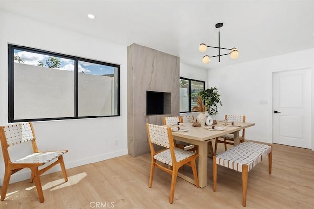 2037 Rayshire St, Thousand Oaks, CA 91362 - dining area featuring light wood finished floors and a chandelier