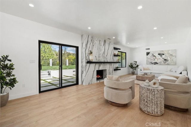 2037 Rayshire St, Thousand Oaks, CA 91362 - living area featuring recessed lighting, a high end fireplace, wood finished floors, and baseboards
