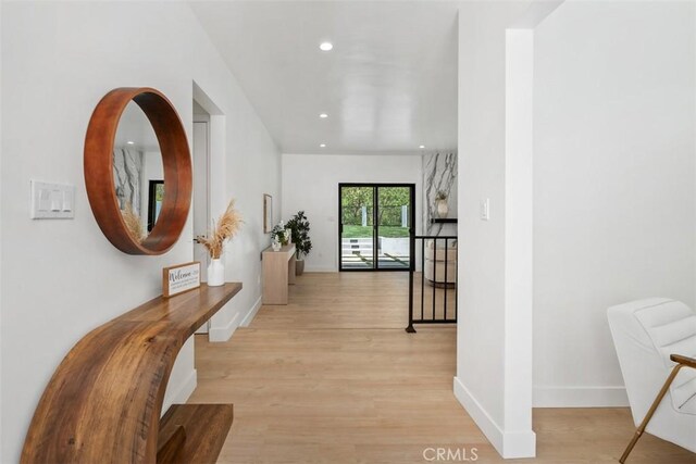 2037 Rayshire St, Thousand Oaks, CA 91362 - hallway featuring light wood-style floors, recessed lighting, and baseboards