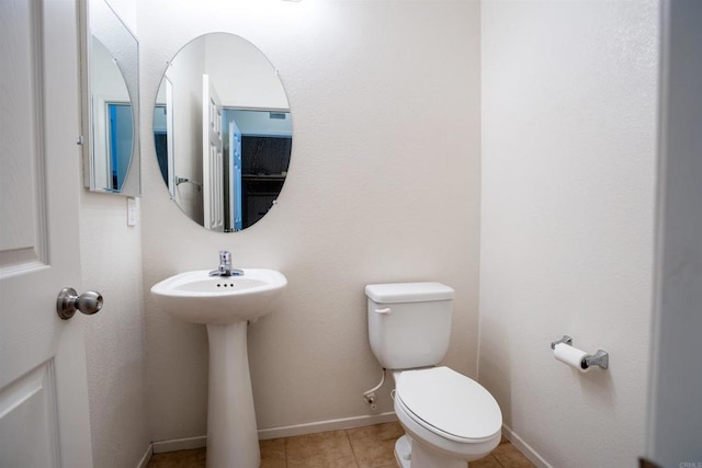 422 Cool Creek Ct Unit 5, Brawley, CA 92227 - half bath featuring toilet and tile patterned flooring