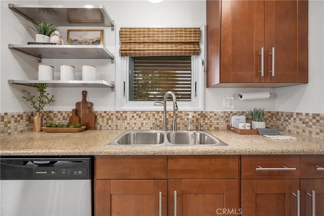 kitchen featuring open shelves, backsplash, dishwasher, a sink, and brown cabinetry
