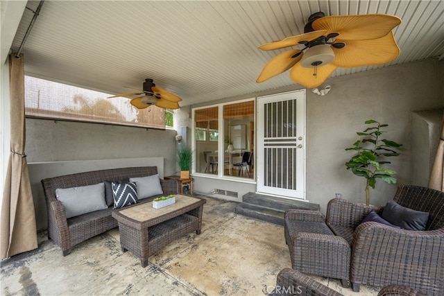 view of patio featuring a ceiling fan, entry steps, and an outdoor hangout area