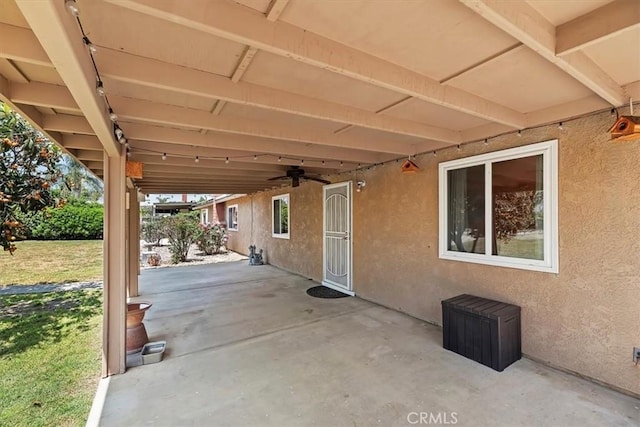 view of patio with a ceiling fan