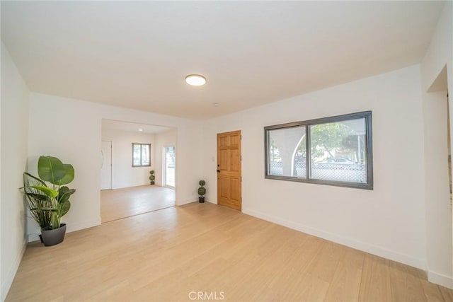 932 S Bon View Ave, Ontario, CA 91761 - empty room with light wood finished floors and baseboards