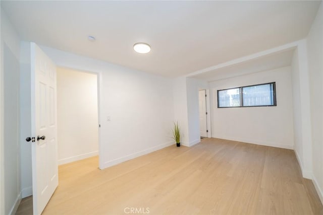 932 S Bon View Ave, Ontario, CA 91761 - empty room featuring light wood-type flooring and baseboards