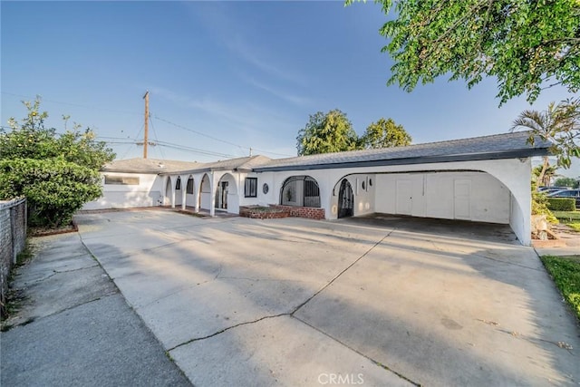 932 S Bon View Ave, Ontario, CA 91761 - single story home with driveway and stucco siding