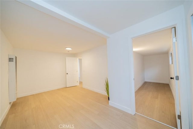 932 S Bon View Ave, Ontario, CA 91761 - unfurnished room with light wood-type flooring and a heating unit