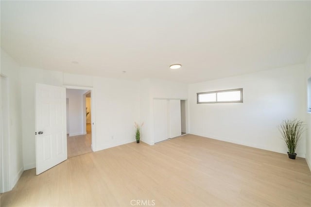 932 S Bon View Ave, Ontario, CA 91761 - empty room with light wood-type flooring