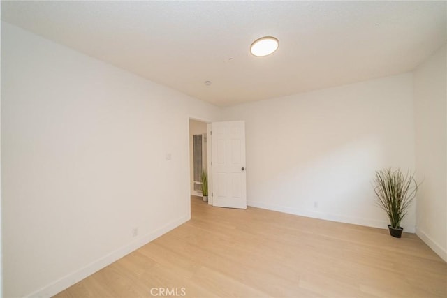932 S Bon View Ave, Ontario, CA 91761 - unfurnished room featuring light wood-type flooring and baseboards
