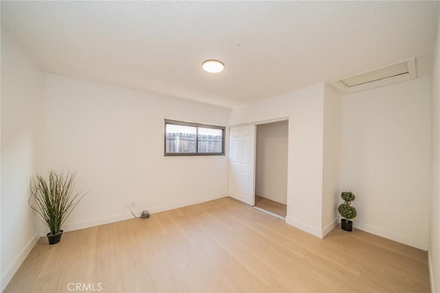932 S Bon View Ave, Ontario, CA 91761 - unfurnished bedroom featuring light wood-style floors and a closet