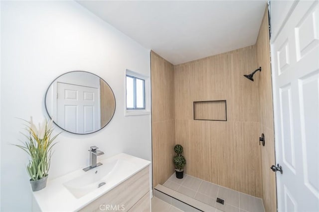 932 S Bon View Ave, Ontario, CA 91761 - full bathroom featuring vanity and a tile shower