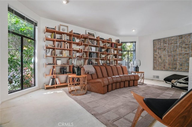 9955 Westwanda Dr, Beverly Hills, CA 90210 - living area with carpet floors, plenty of natural light, and recessed lighting