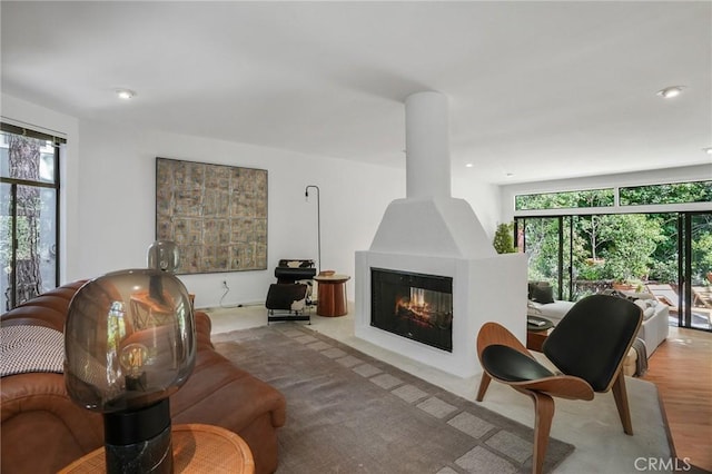 9955 Westwanda Dr, Beverly Hills, CA 90210 - living area with recessed lighting, wood finished floors, and a fireplace