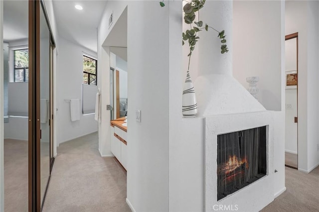 9955 Westwanda Dr, Beverly Hills, CA 90210 - corridor featuring light colored carpet and recessed lighting