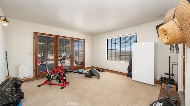 18668 Lemert St, Hesperia, CA 92345 - workout area featuring carpet flooring, french doors, and baseboards