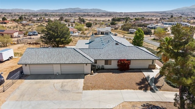18668 Lemert St, Hesperia, CA 92345 - drone / aerial view featuring a mountain view and a residential view