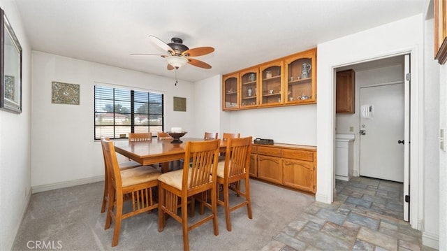 18668 Lemert St, Hesperia, CA 92345 - dining space with ceiling fan and stone finish floor