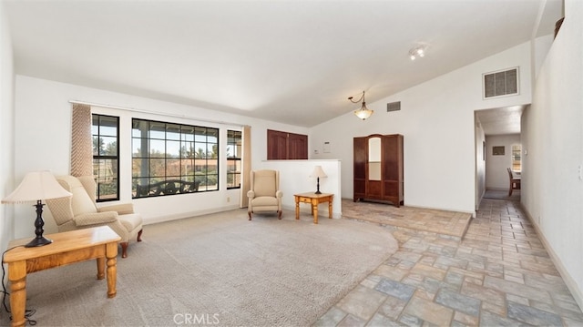 18668 Lemert St, Hesperia, CA 92345 - sitting room with high vaulted ceiling, baseboards, and visible vents