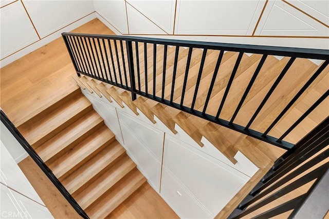 staircase featuring wood finished floors