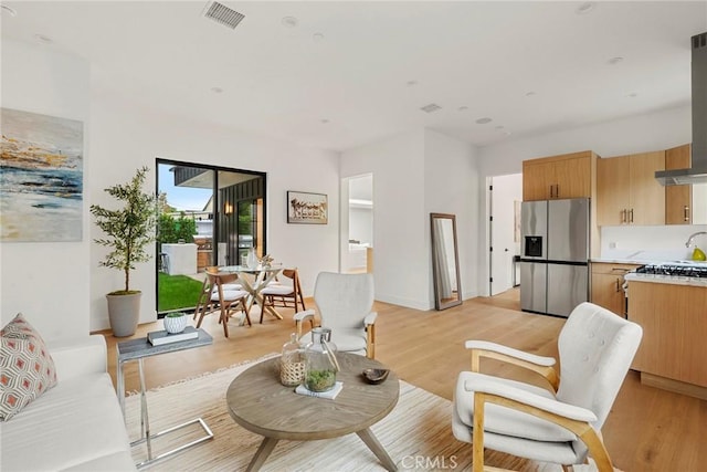 living area with light wood-type flooring