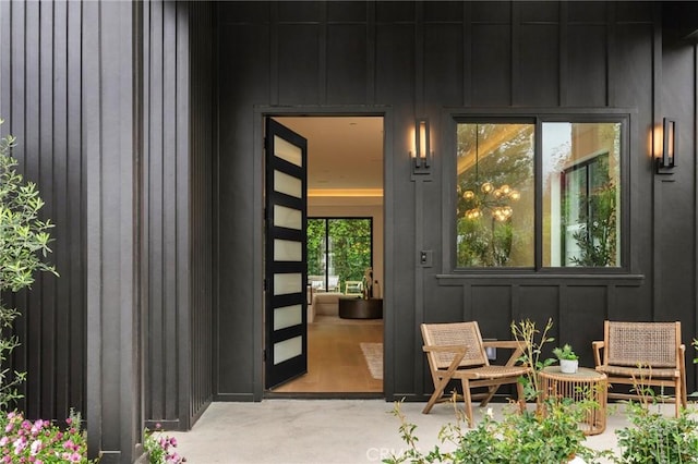 property entrance with board and batten siding