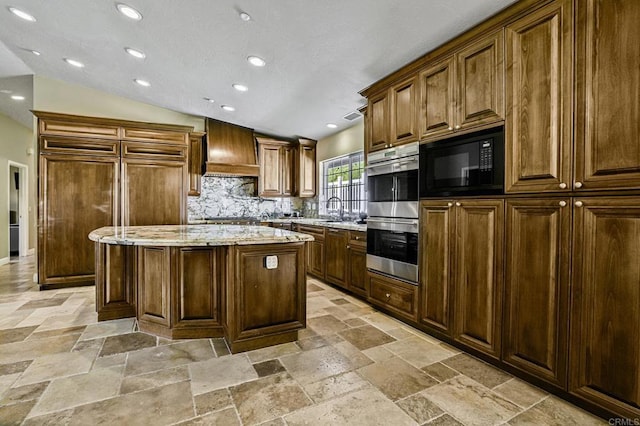 kitchen with backsplash, vaulted ceiling, built in appliances, and custom range hood