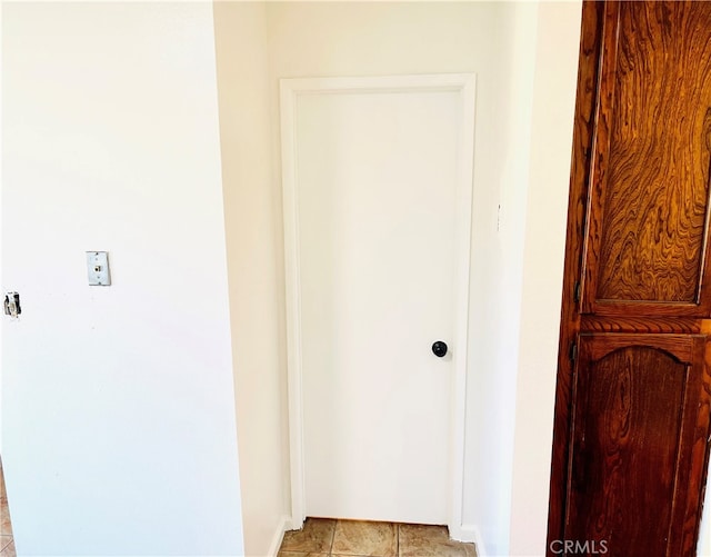 7260 Richfield St Unit 305, Paramount, CA 90723 - hallway with baseboards and light tile patterned flooring