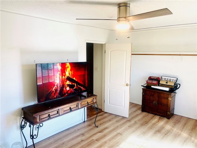 7260 Richfield St Unit 305, Paramount, CA 90723 - interior space featuring a ceiling fan, a textured ceiling, and wood finished floors