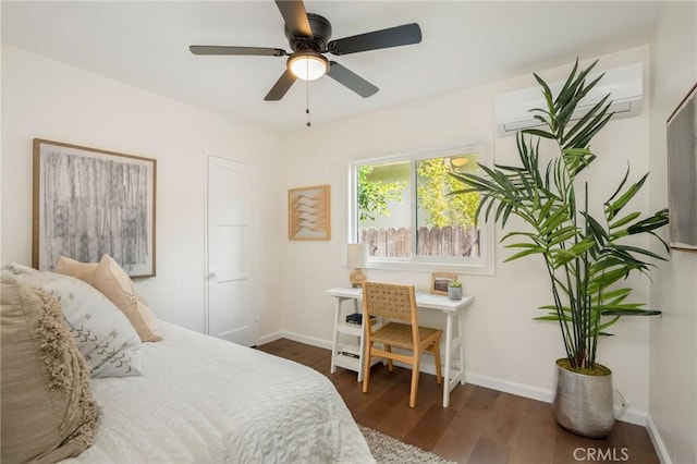 bedroom featuring dark wood-style floors, baseboards, and a ceiling fan