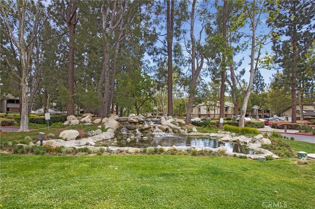20702 El Toro Rd Unit 379, Lake Forest, CA 92630 - view of home's community with a lawn