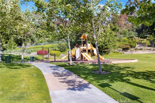 20702 El Toro Rd Unit 379, Lake Forest, CA 92630 - community jungle gym featuring a lawn