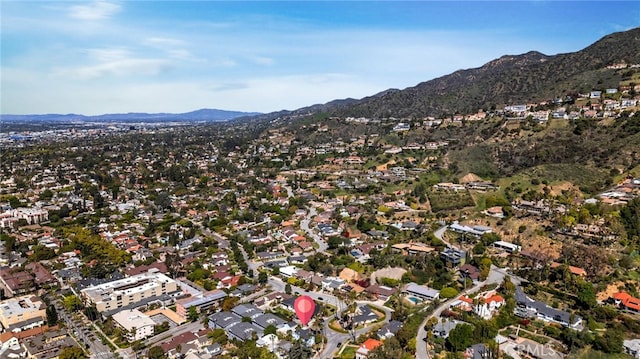 drone / aerial view featuring a mountain view and a residential view