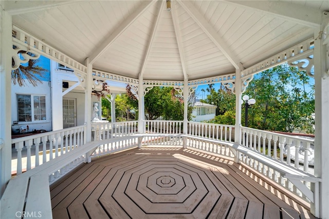 wooden deck featuring a gazebo