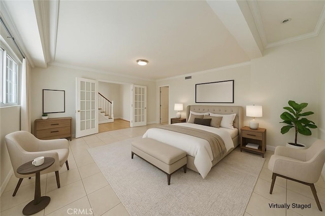 bedroom featuring light tile patterned floors, baseboards, and crown molding